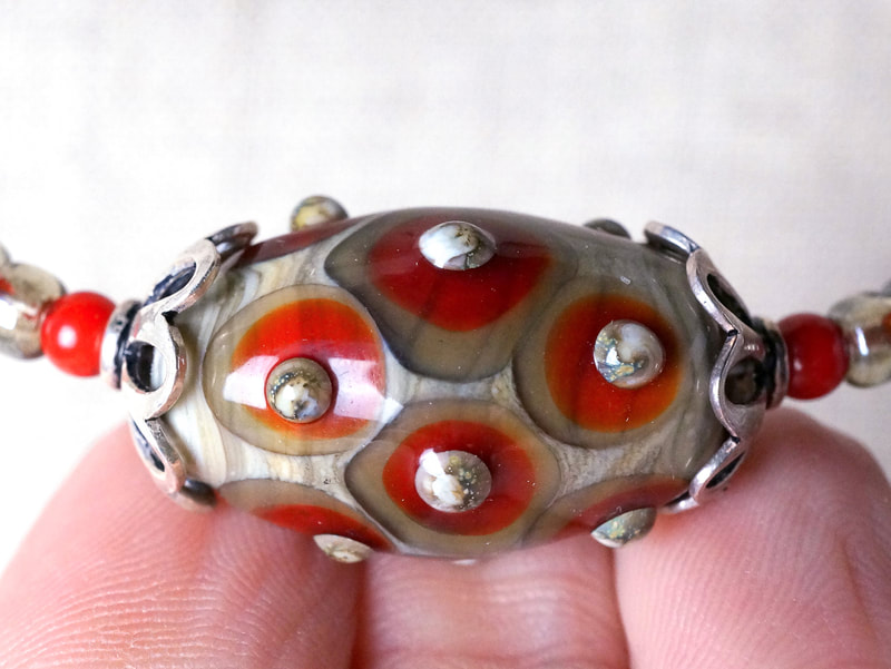 Close up of a handmade glass bead
