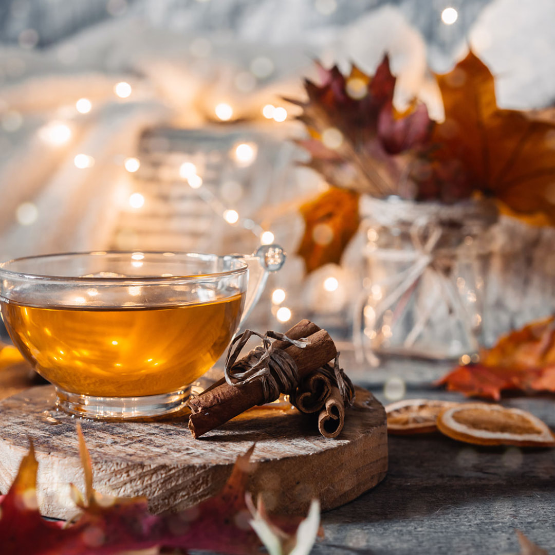 hot tea, fragrant herbs and twinkle lights setup for hygge time
