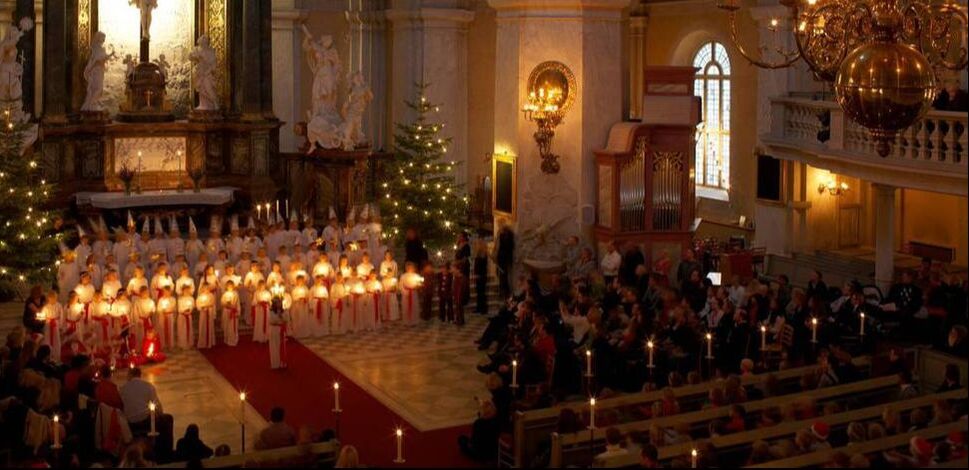a candle lit santa lucia celebration