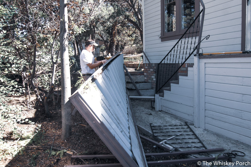 removing the back stairs and metal roof cover