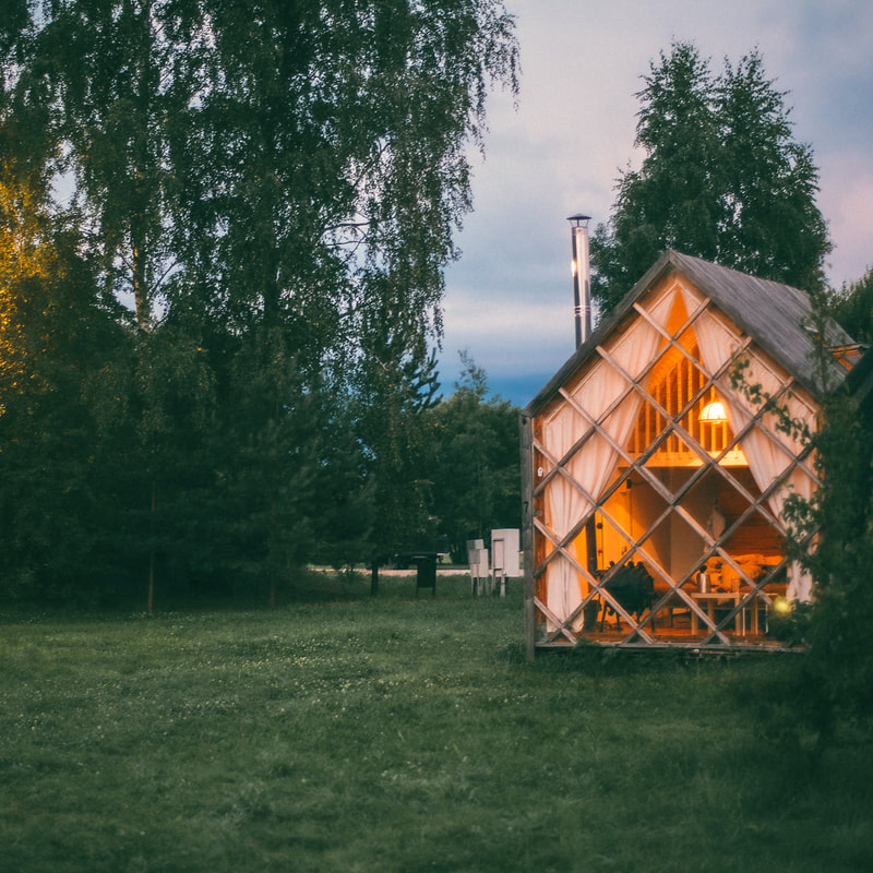 A charming tiny house in a meadow