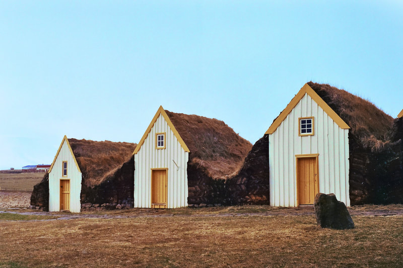Icelandic cottages with sodden roofs